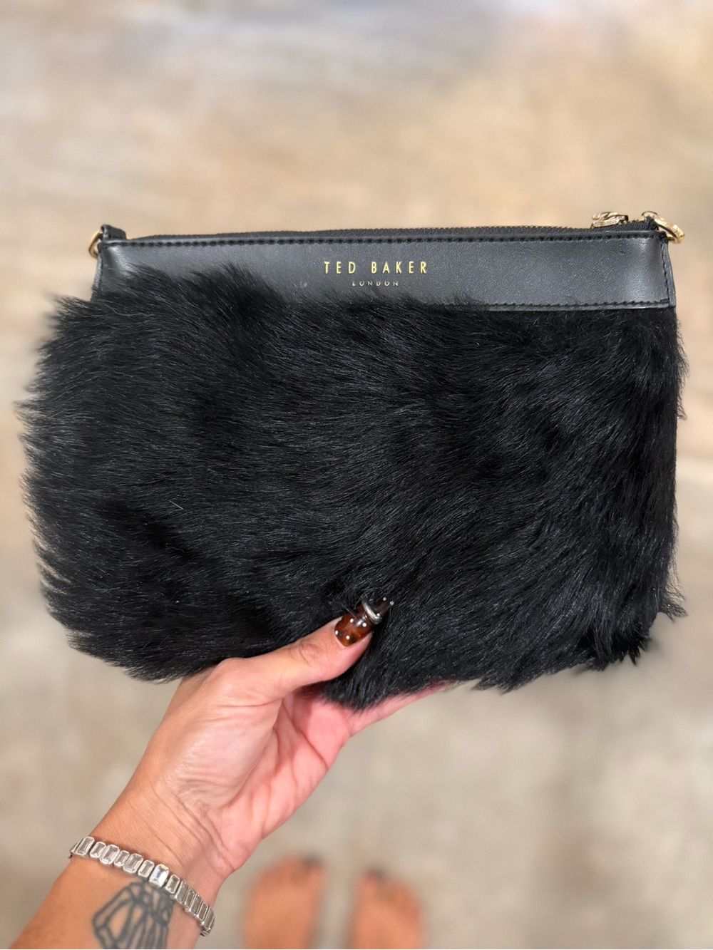 Ted Baker Black Faux Fur Wristlet with Gold Logo Trim